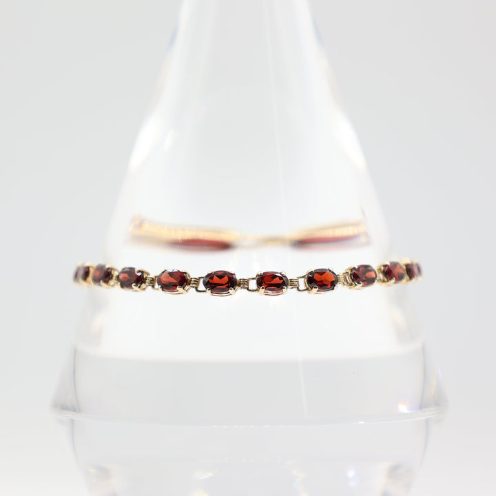 10k Yellow Gold Garnet Tennis Bracelet 7.5in.