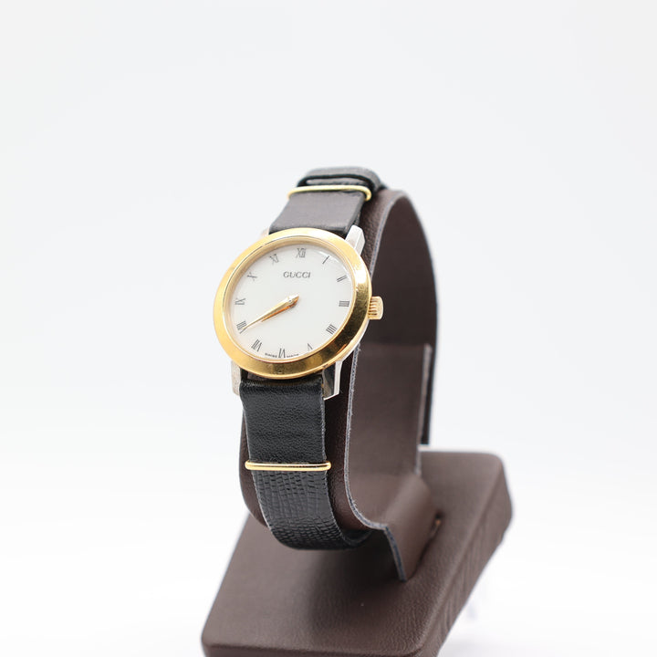 Gucci Swiss Made Gold Tone Watch With Black Kreisler Band