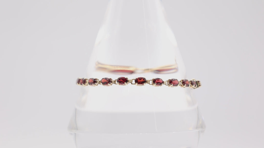 10k Yellow Gold Garnet Tennis Bracelet 7.5in.