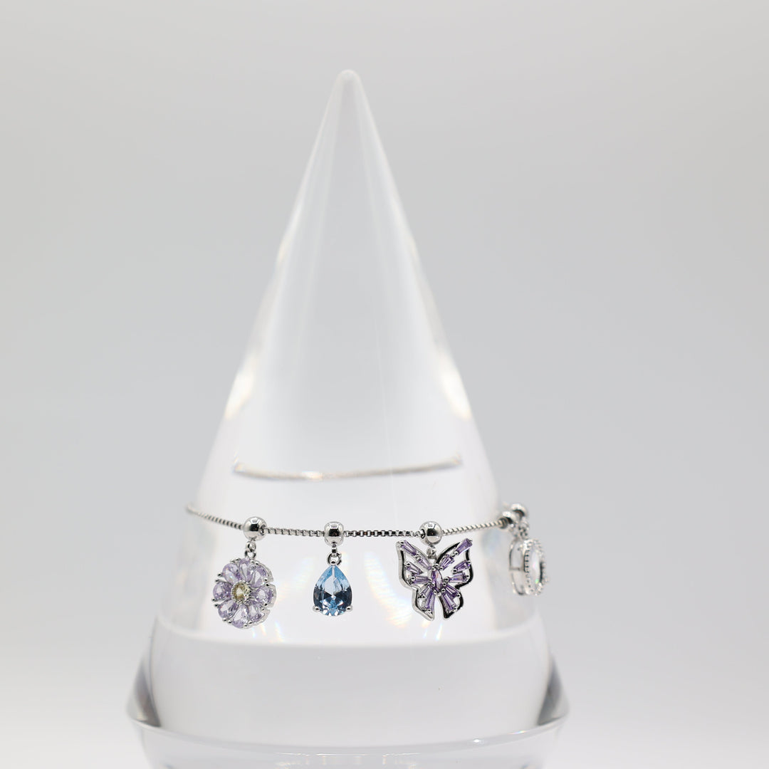 Costume Silver Toned Purple and White Glass Butterfly, flower, Teardrop Charm Adjustable Bracelet - 5.5 inches