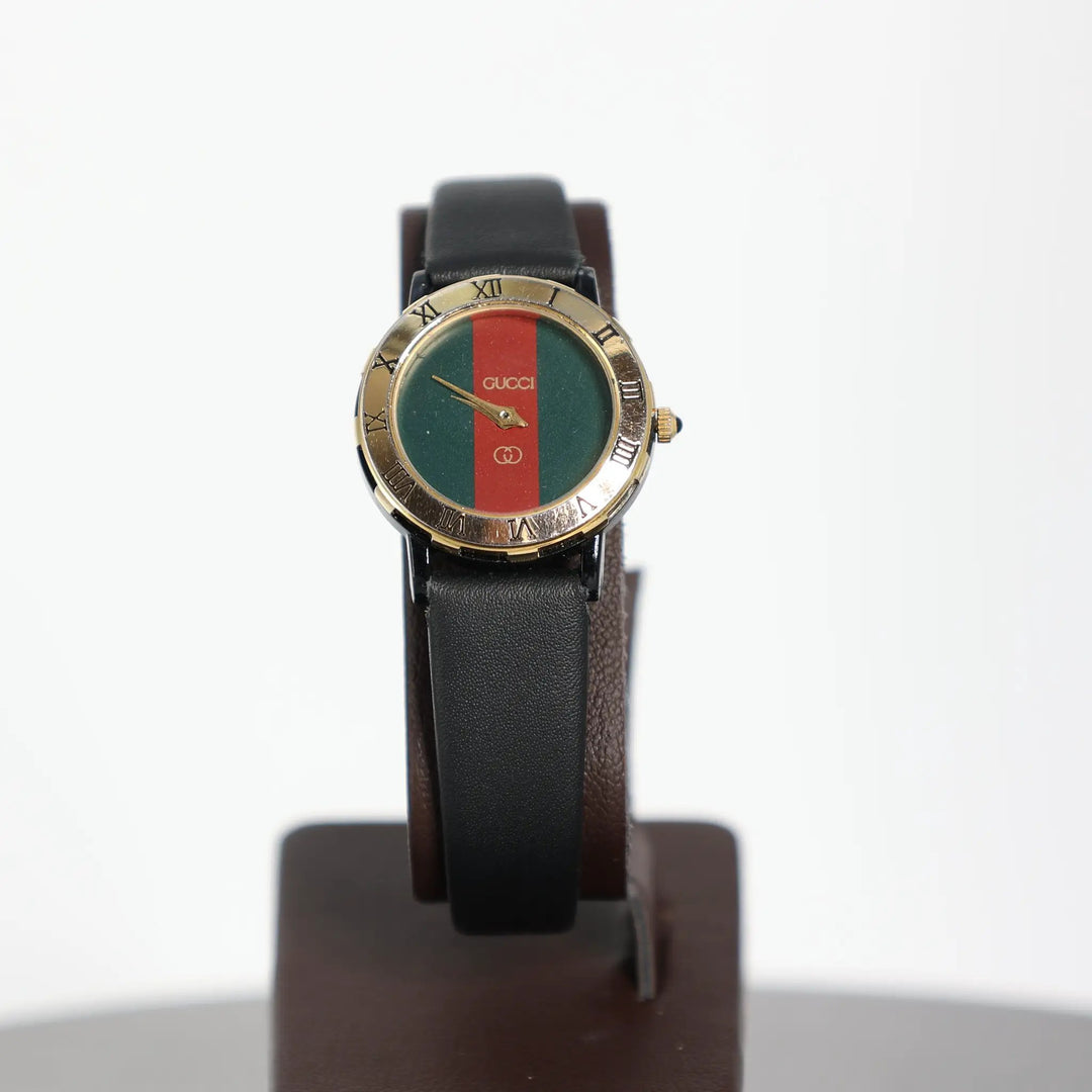 Gucci Gold Plated Red and Green Striped Dial Watch by Annie McConnell's Renewed Elegance