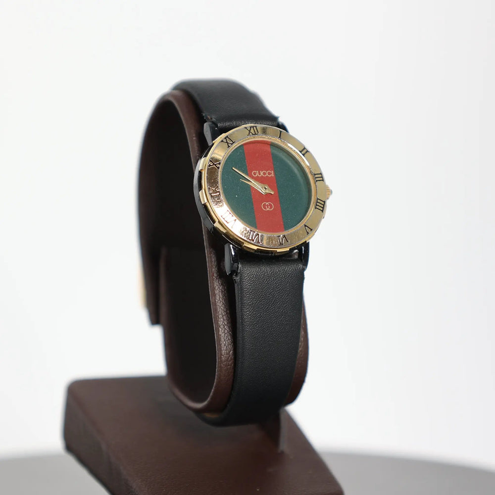 Gucci Gold Plated Red and Green Striped Dial Watch by Annie McConnell's Renewed Elegance