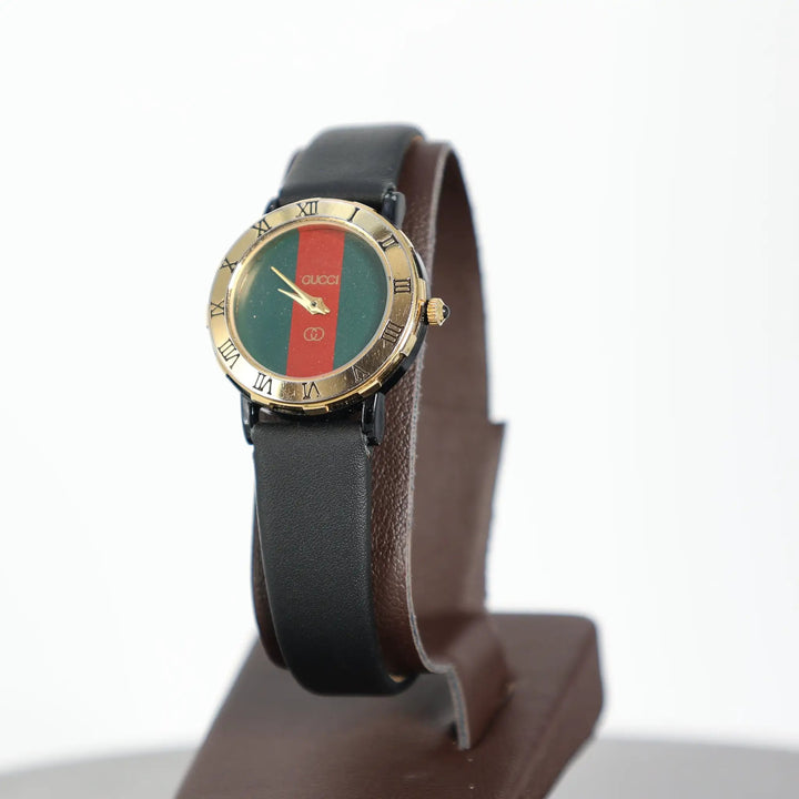 Gucci Gold Plated Red and Green Striped Dial Watch by Annie McConnell's Renewed Elegance
