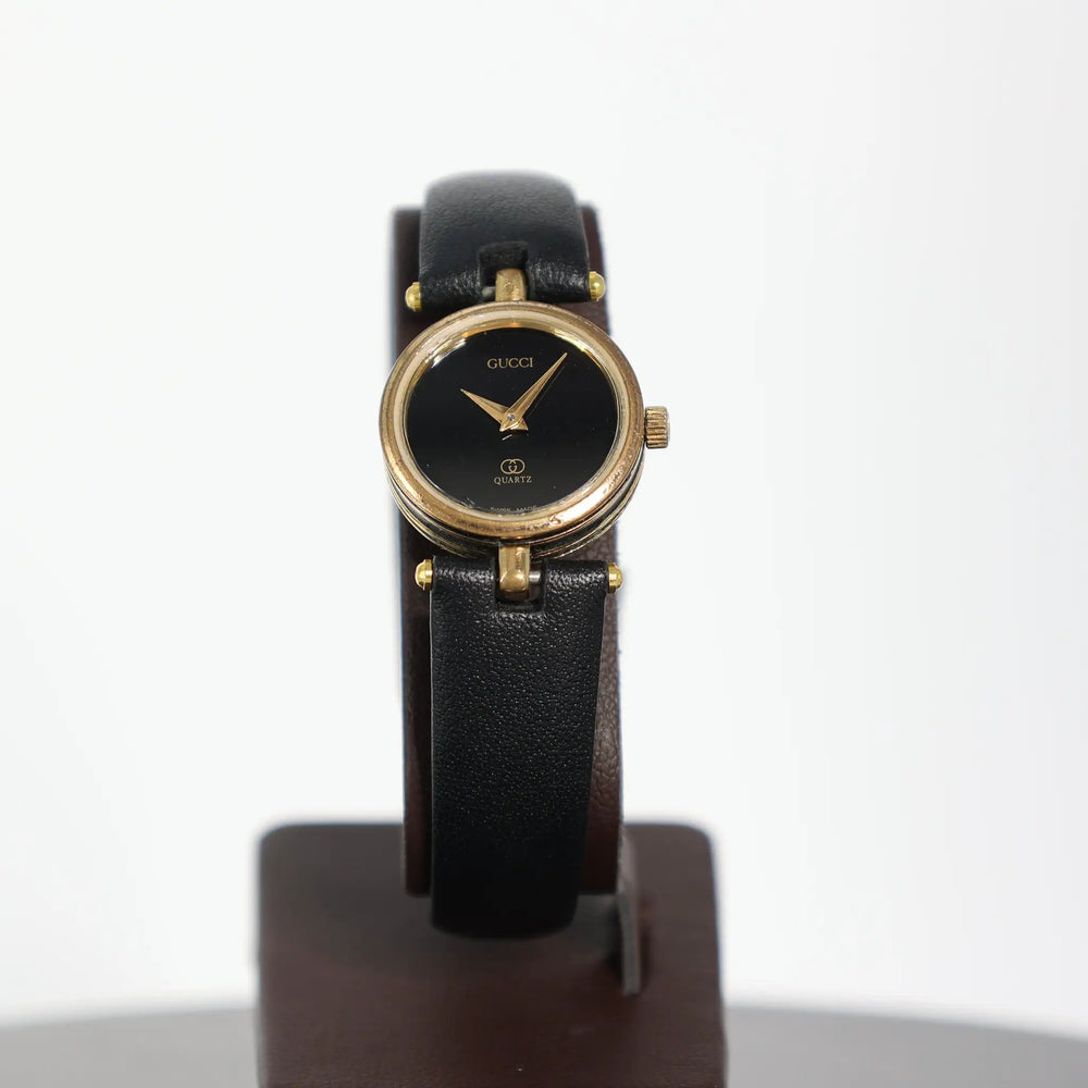 Gucci Round Gold Plated Black GG Quartz Watch Classic Luxury by Annie McConnell's Renewed Elegance