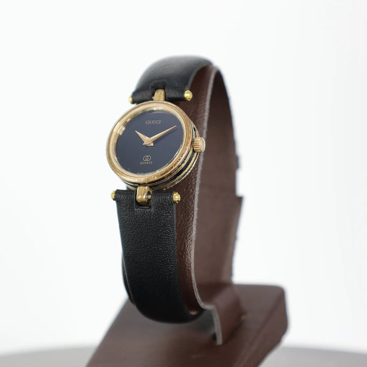 Gucci Round Gold Plated Black GG Quartz Watch Classic Luxury by Annie McConnell's Renewed Elegance