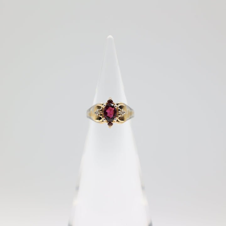 10k Yellow Gold 7x5mm Oval Garnet Stone with Diamond Accents Ring Size 5.75