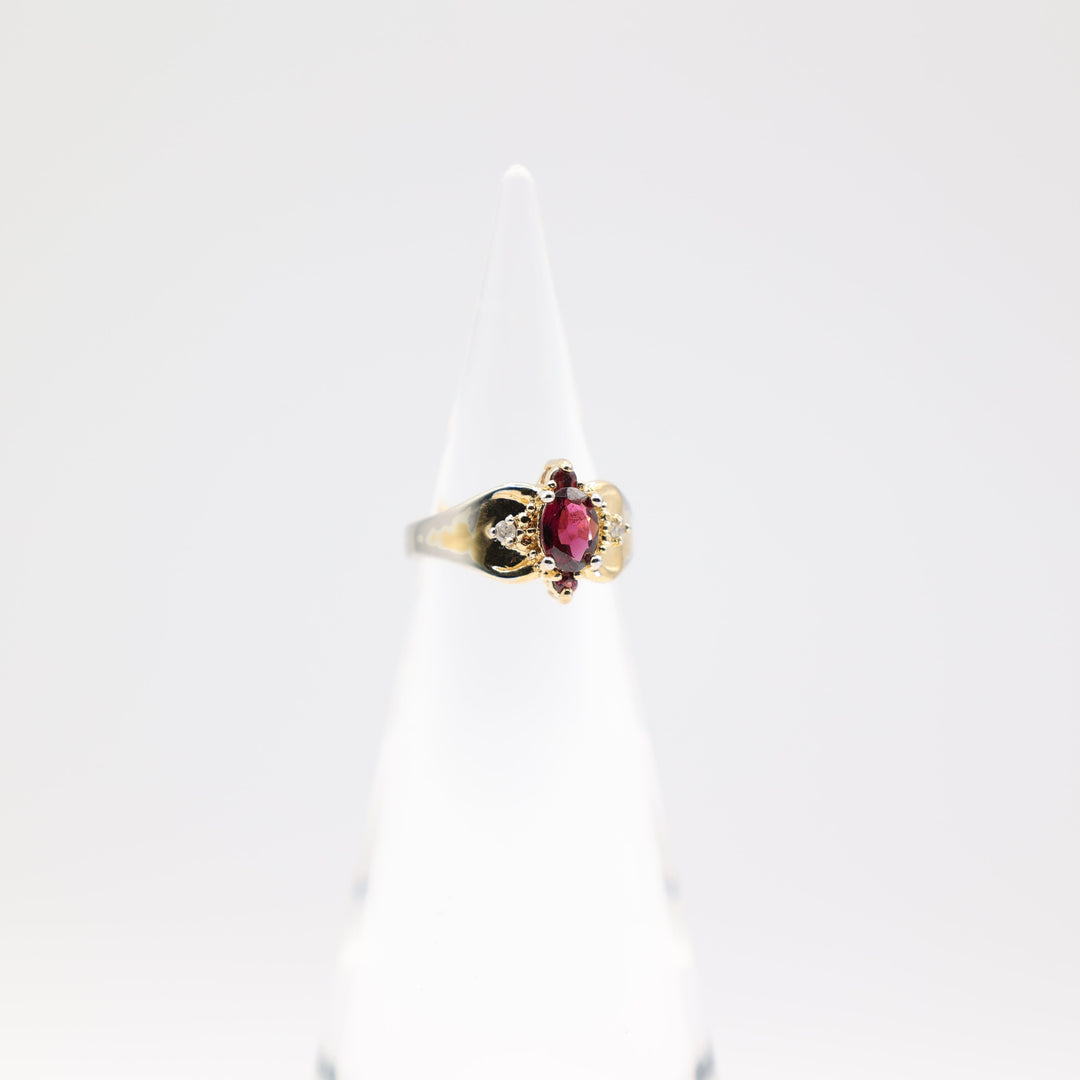 10k Yellow Gold 7x5mm Oval Garnet Stone with Diamond Accents Ring Size 5.75