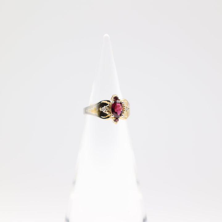 10k Yellow Gold 7x5mm Oval Garnet Stone with Diamond Accents Ring Size 5.75