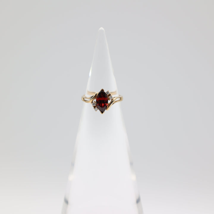 14k Yellow Gold .12ctw Diamonds Garnet Open Accent Bypass Ring Size 5