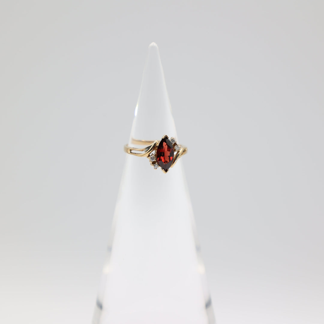 14k Yellow Gold .12ctw Diamonds Garnet Open Accent Bypass Ring Size 5