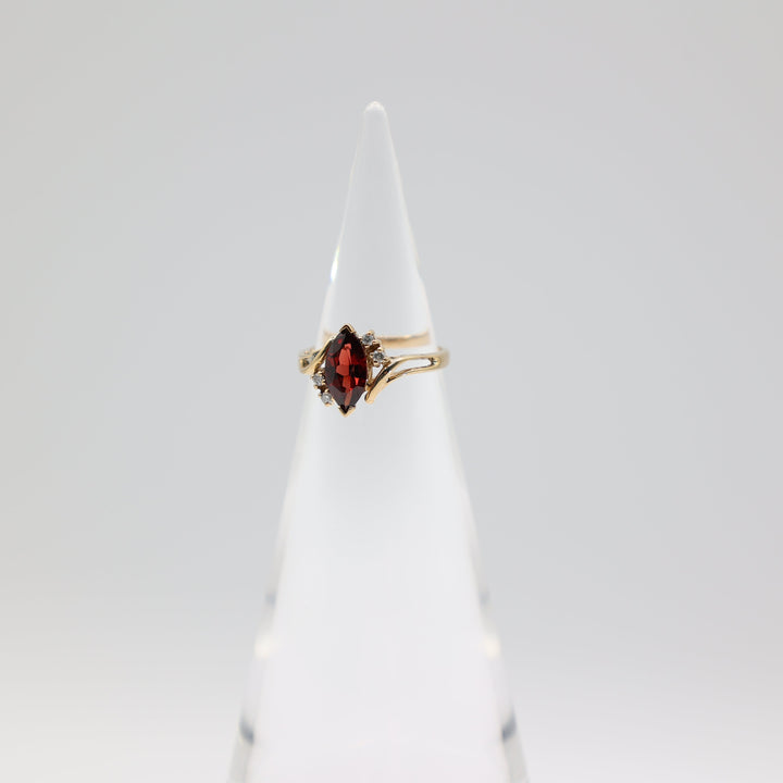 14k Yellow Gold .12ctw Diamonds Garnet Open Accent Bypass Ring Size 5