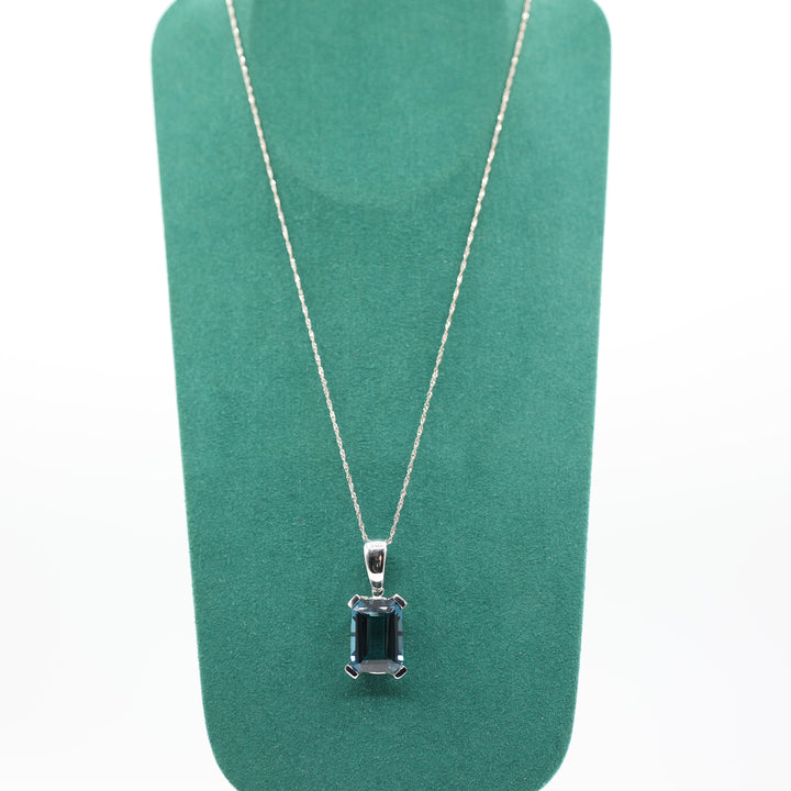 14K White Gold Blue Topaz Emerald Cut Pendant Necklace