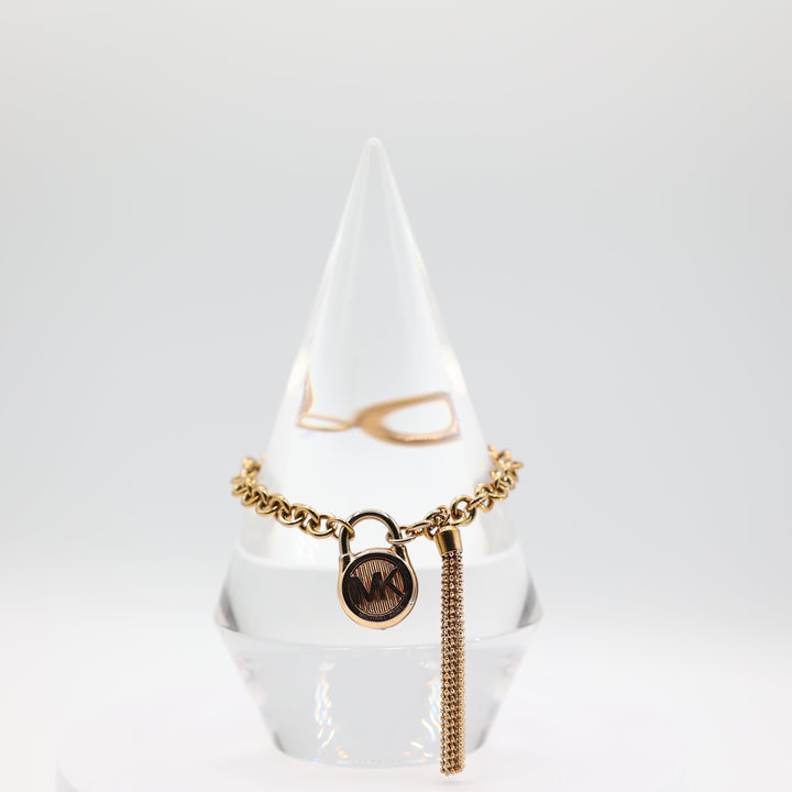 Michael Kors Gold Tone Chain Bracelet with Padlock and Tassel
