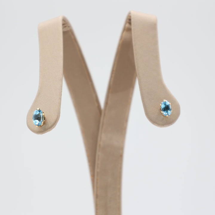 14K Yellow Gold 6x4mm Blue Topaz Stud Earrings