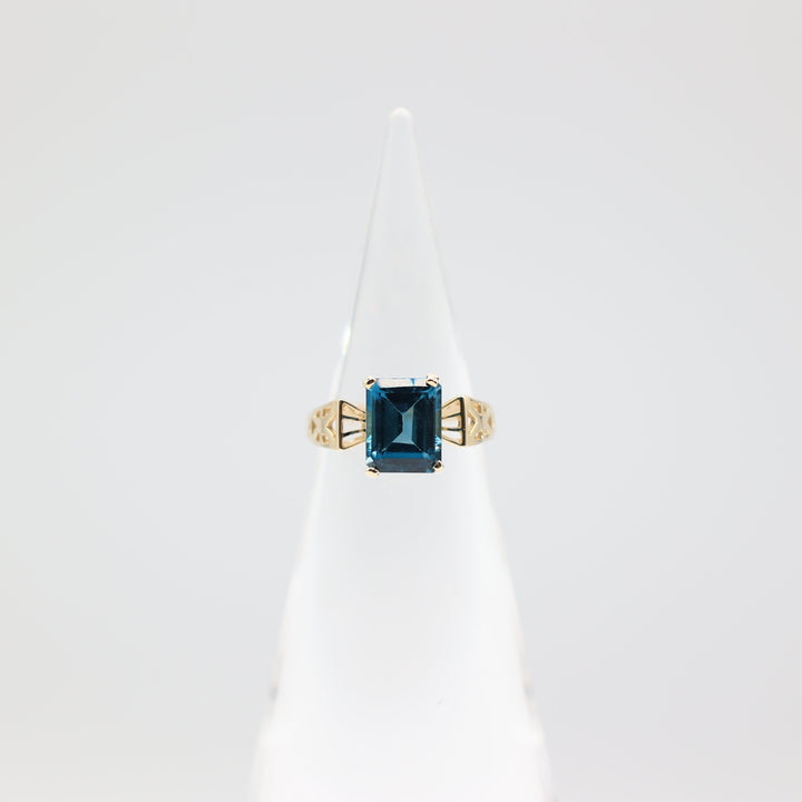 10k Yellow Gold Emerald Cut Blue Topaz Cocktail Ring - Size 7.5