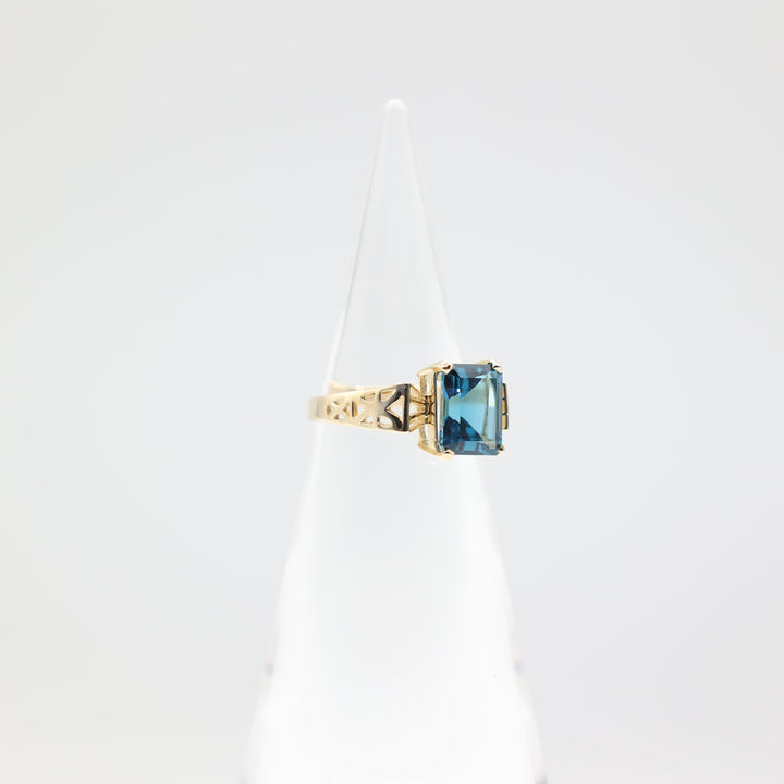 10k Yellow Gold Emerald Cut Blue Topaz Cocktail Ring - Size 7.5