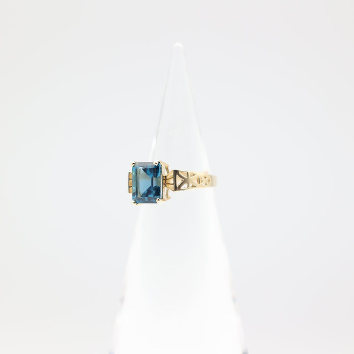 10k Yellow Gold Emerald Cut Blue Topaz Cocktail Ring - Size 7.5