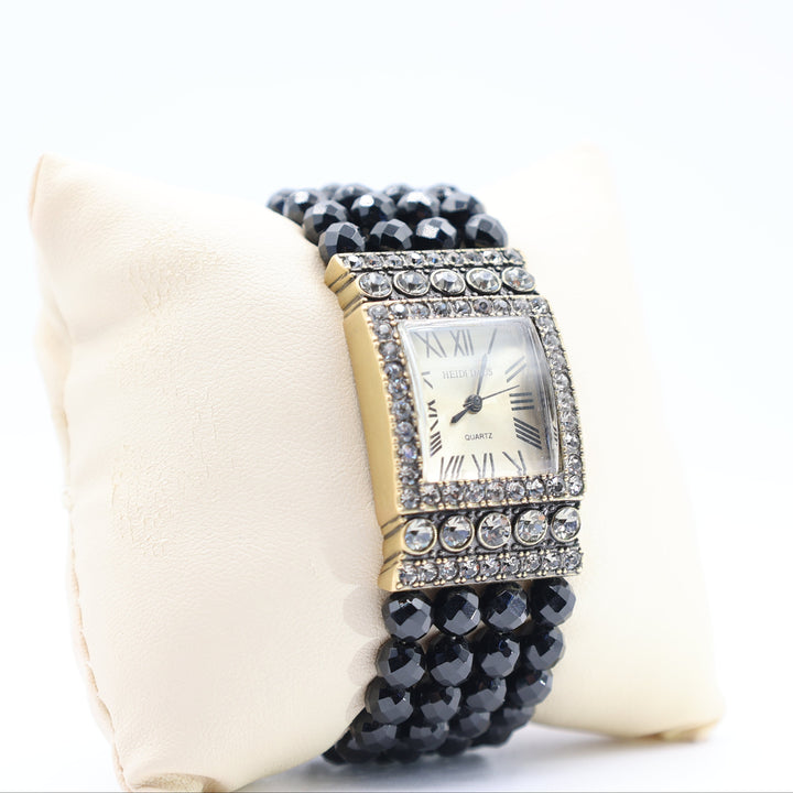 Rhinestone and beaded Quartz Heidi Daus Watch