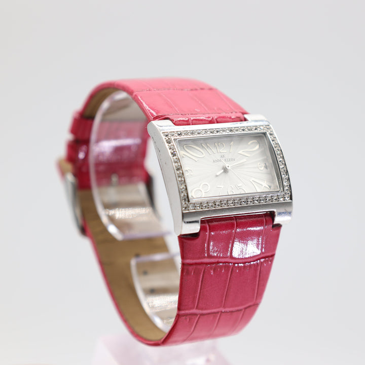 Anne Klein 10/6703 Rectangular Silver Watch with Rhinestones and Pink Leather Band