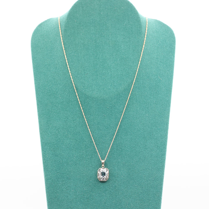10k Yellow Gold Blue Topaz and White Diamond Filigree Pendant Necklace - 9.5 in.