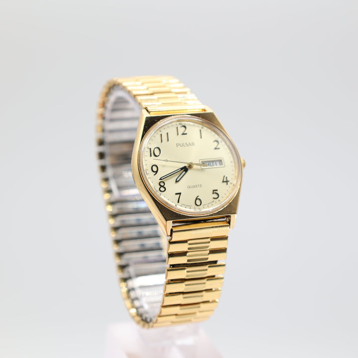 PULSAR Yellow Gold Toned Round Gold Color Dial with Stretch Band