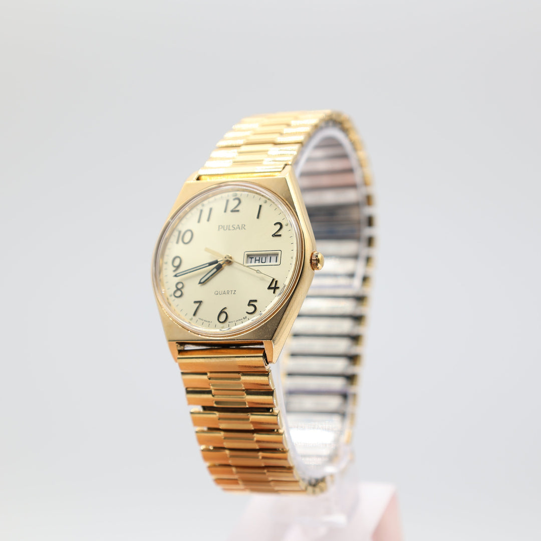PULSAR Yellow Gold Toned Round Gold Color Dial with Stretch Band