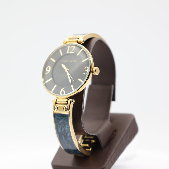 Anne Klein Large Round Navy Blue Watch with Gold Tone Trim and Navy Blue Marble Style Band