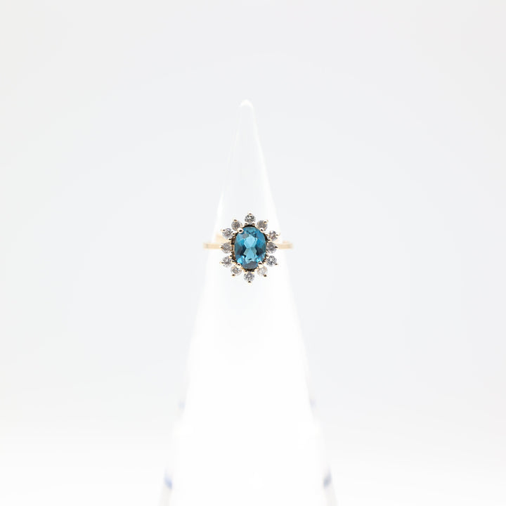 14k Yellow Gold 8mm x 6mm Oval Blue Topaz Ring Size 5