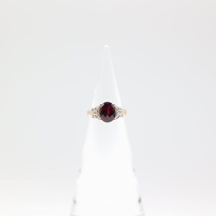10k Yellow Gold with Butterfly Diamonds Oval Garnet Size 6.75