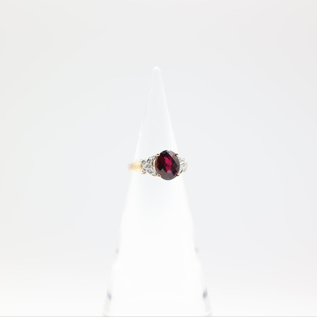 10k Yellow Gold with Butterfly Diamonds Oval Garnet Size 6.75