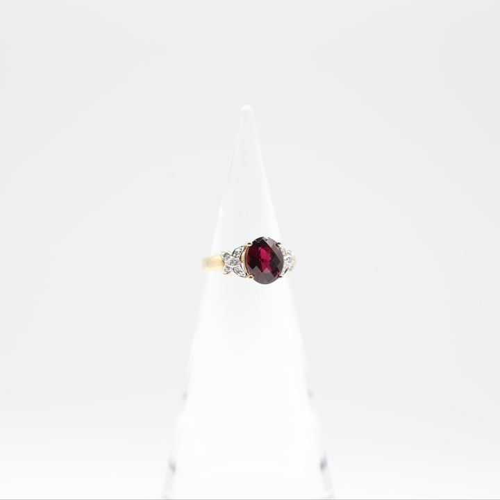 10k Yellow Gold with Butterfly Diamonds Oval Garnet Size 6.75