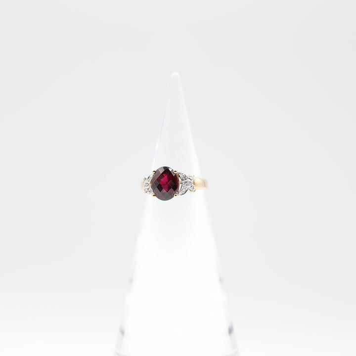 10k Yellow Gold with Butterfly Diamonds Oval Garnet Size 6.75