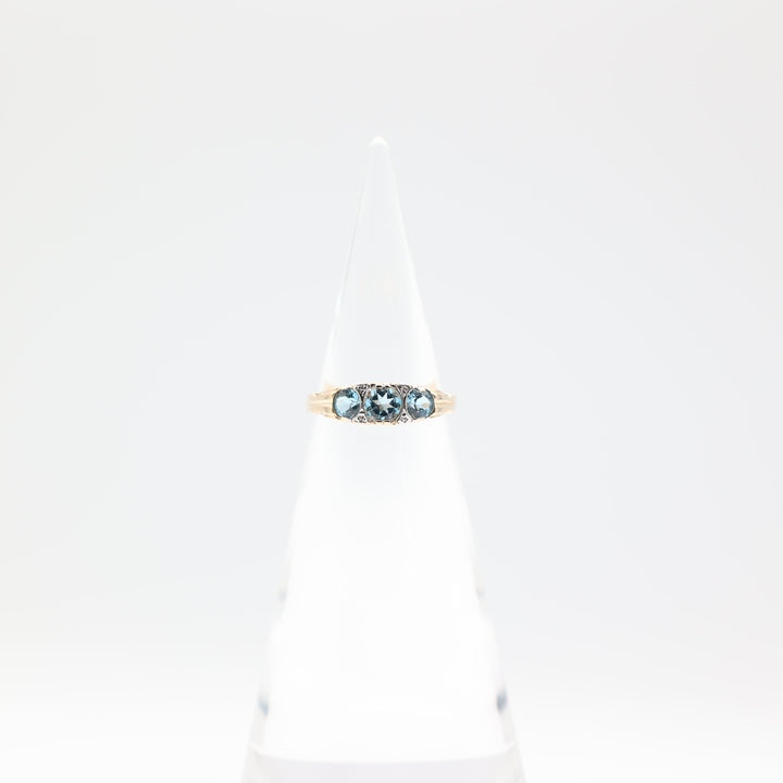 14k Yellow Gold Band with 3 Round Blue Topaz Stones