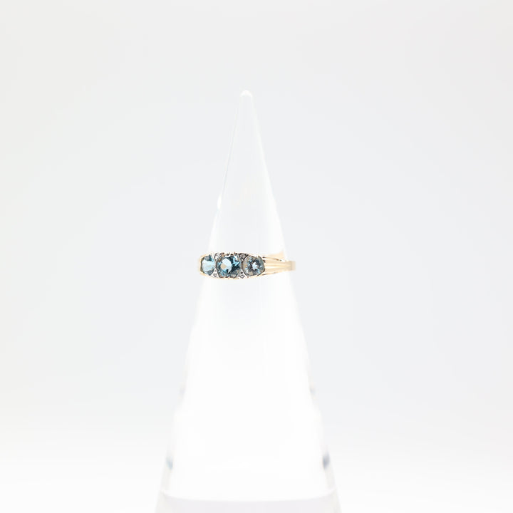 14k Yellow Gold Band with 3 Round Blue Topaz Stones