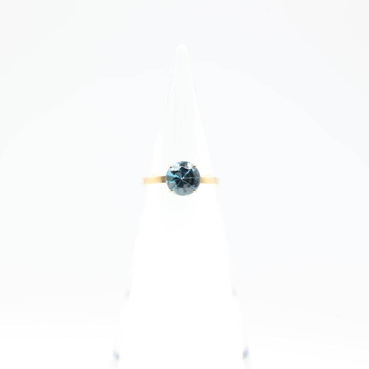 17k Yellow Gold Band with Round Blue Topaz Ring Size 7