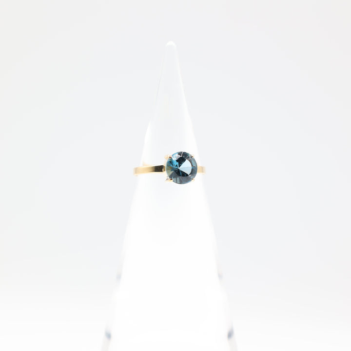 17k Yellow Gold Band with Round Blue Topaz Ring Size 7