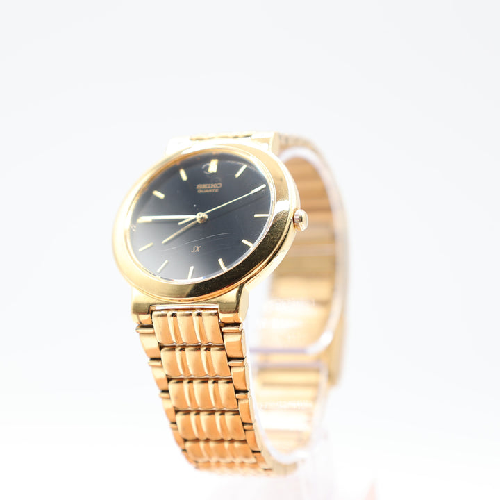Seiko V701-1K00 Stainless Steel Gold Tone Black Dial Watch