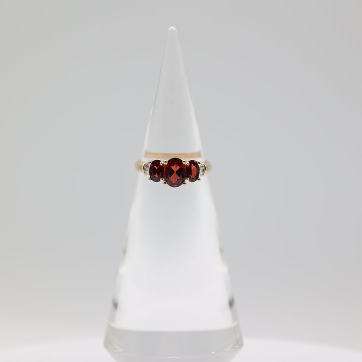 14K Yellow Gold Ring With 3 Garnets 8x6mm 6x4mm And 4 White Diamonds 2mm Size 9