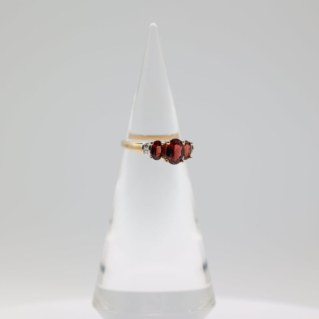 14K Yellow Gold Ring With 3 Garnets 8x6mm 6x4mm And 4 White Diamonds 2mm Size 9
