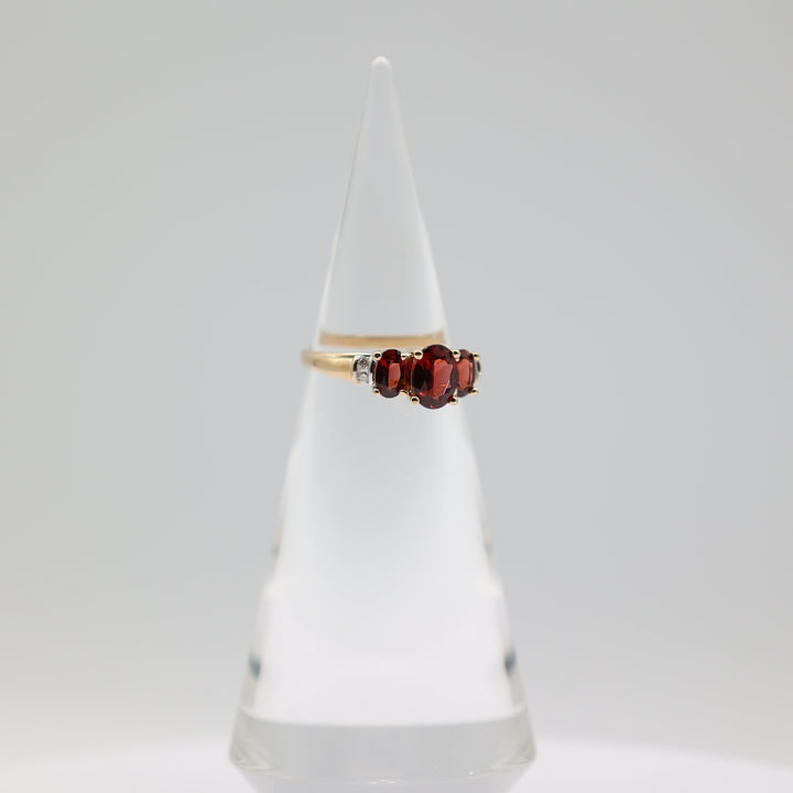 14K Yellow Gold Ring With 3 Garnets 8x6mm 6x4mm And 4 White Diamonds 2mm Size 9