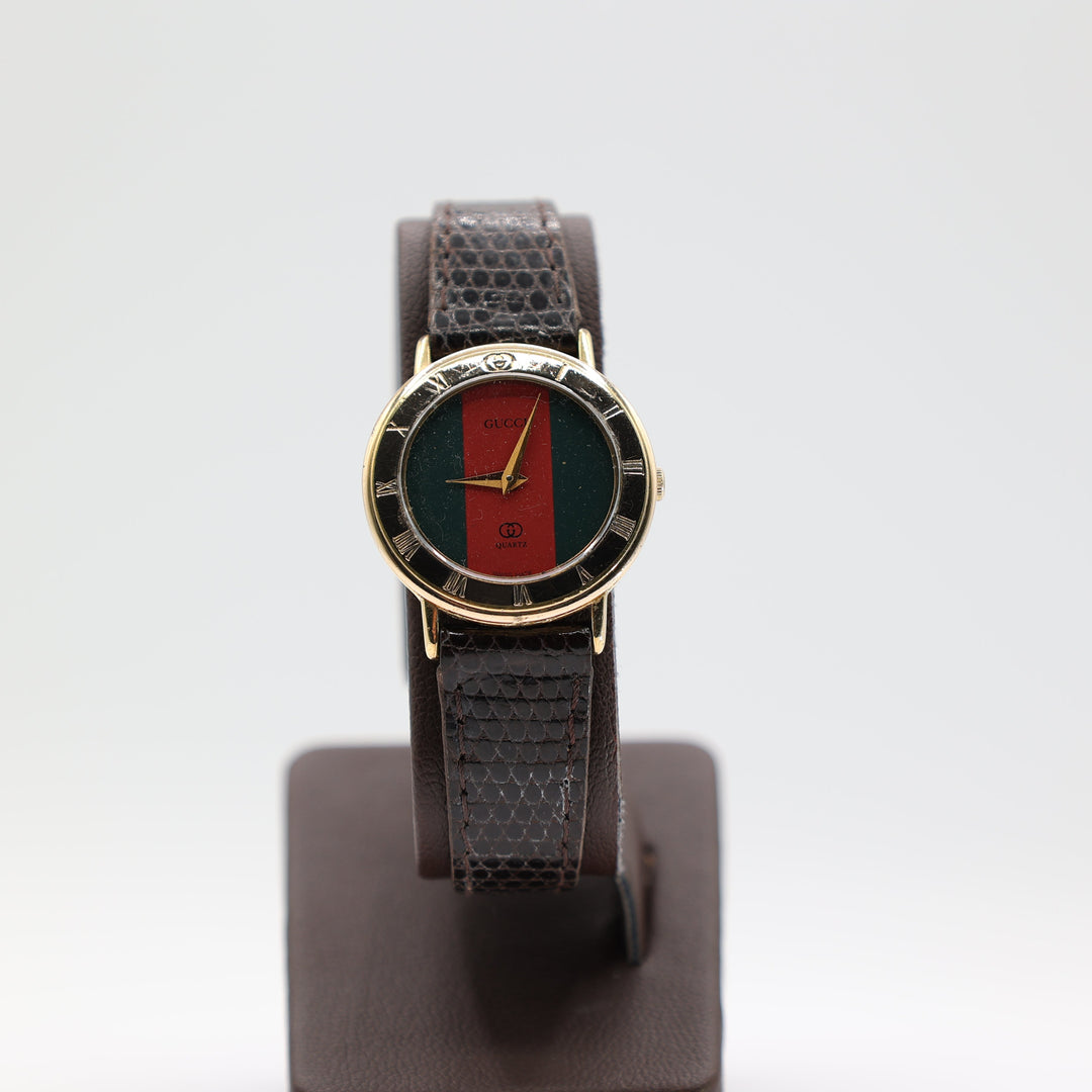 Gucci Gold Tone Watch With Green And Red Dial Brown Leather Strap