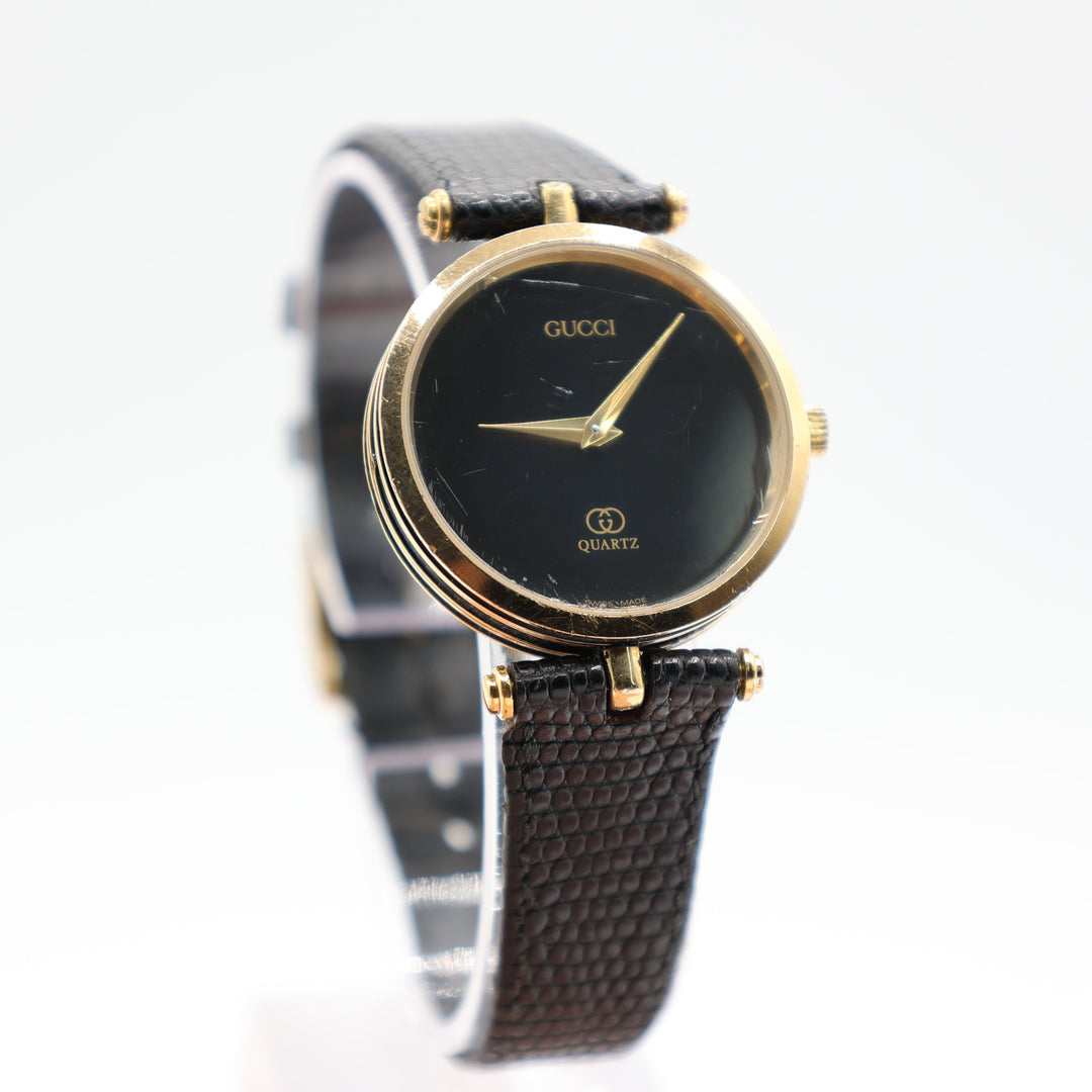 Gucci Black And Gold Tone Quartz Watch Luxury Timepiece