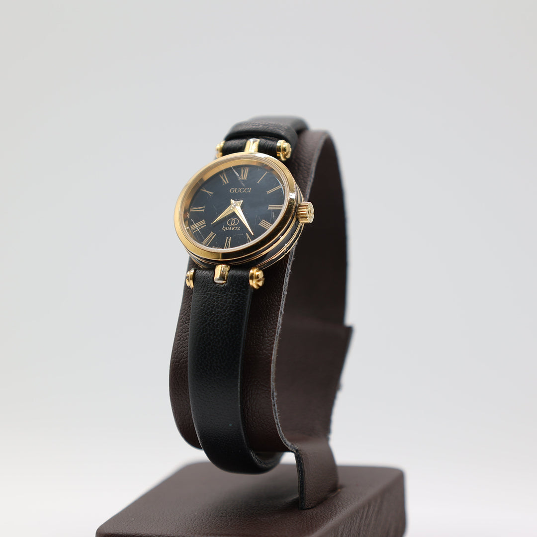 Gucci Swiss Made Quartz Gold Tone Black Leather Watch