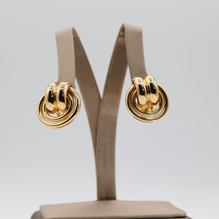 Burberrys Authentic Gold Tone Knot Clip On Earrings