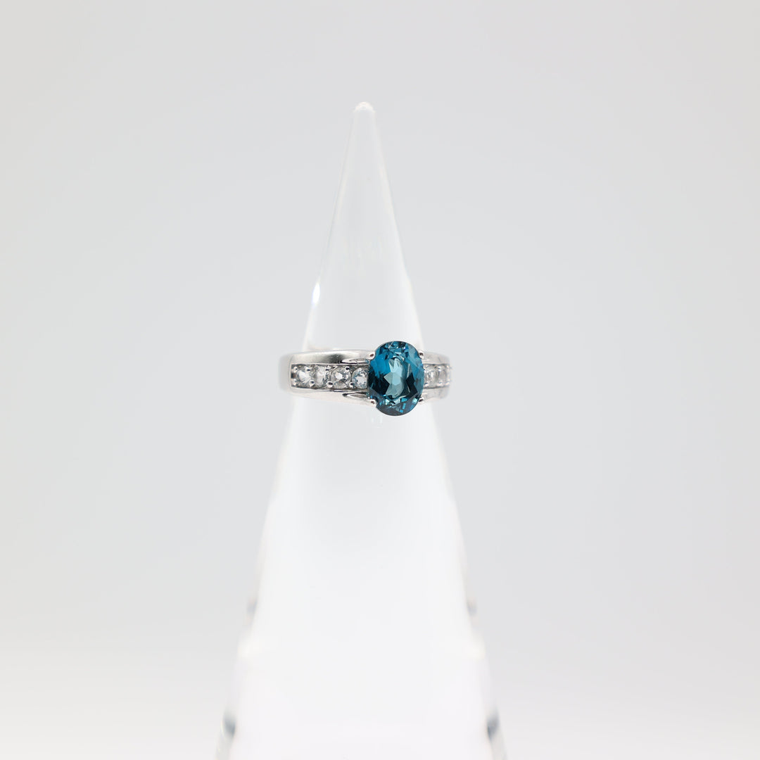 925 Sterling Silver Band with White Topaz Accents and Blue Topaz Oval Stone Ring Size 7