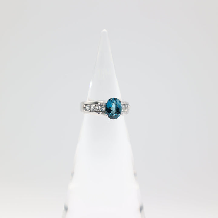 925 Sterling Silver Band with White Topaz Accents and Blue Topaz Oval Stone Ring Size 7