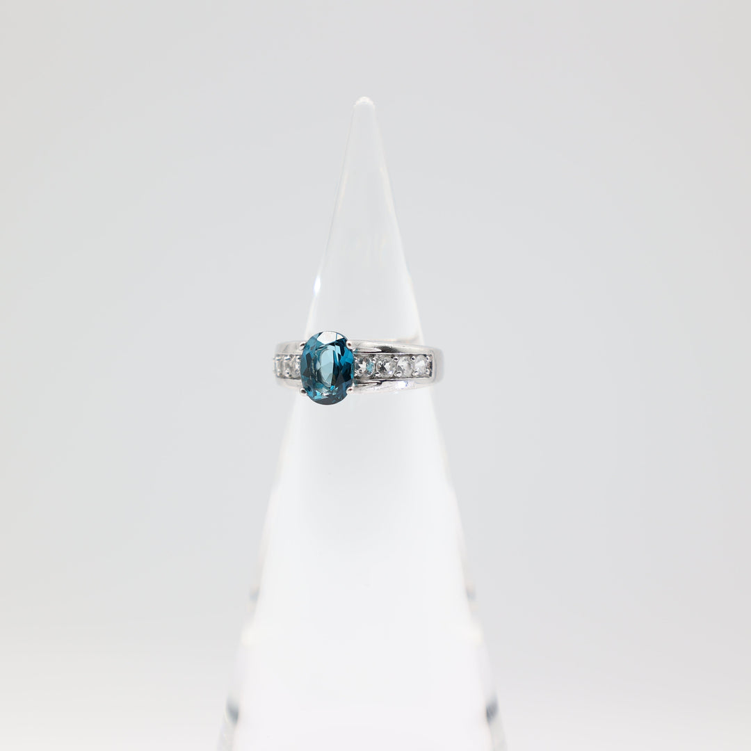 925 Sterling Silver Band with White Topaz Accents and Blue Topaz Oval Stone Ring Size 7