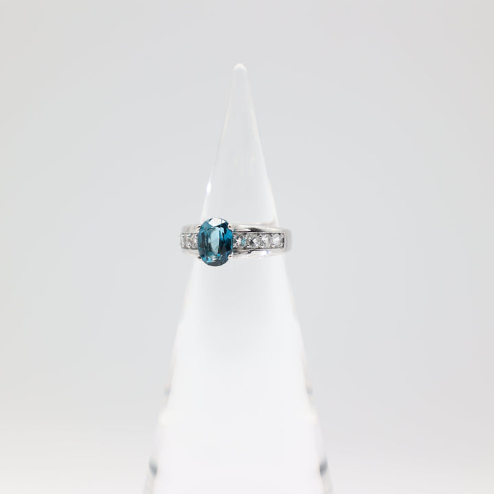 925 Sterling Silver Band with White Topaz Accents and Blue Topaz Oval Stone Ring Size 7