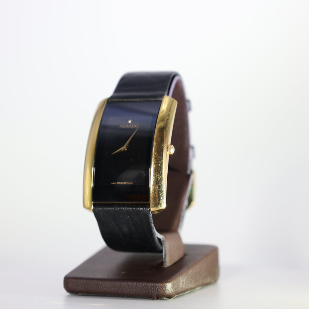Movado La Nouvelle Rectangular Gold Tone and Black Leather Watch