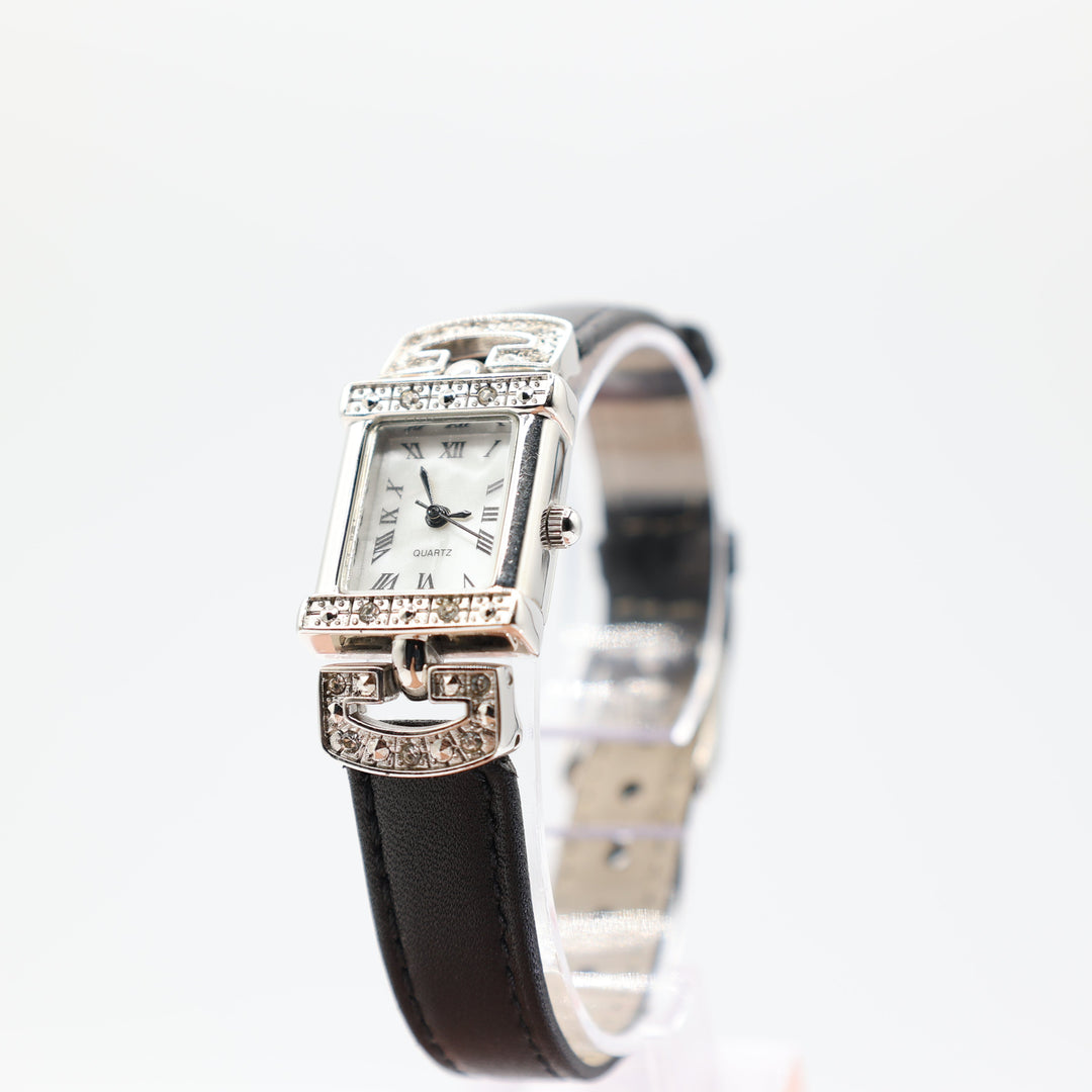 Avon Silver Tone White Pearl Dial Pave Black Leather Watch